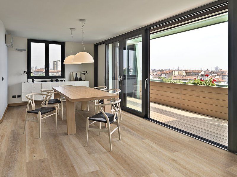 Luxury vinyl plank floors from SAR Floors in a modern dining room scene